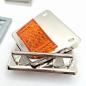 Preview: Mappenschloss SMILA 51 x 46 mm Reflektor silber ORANGE Tornister